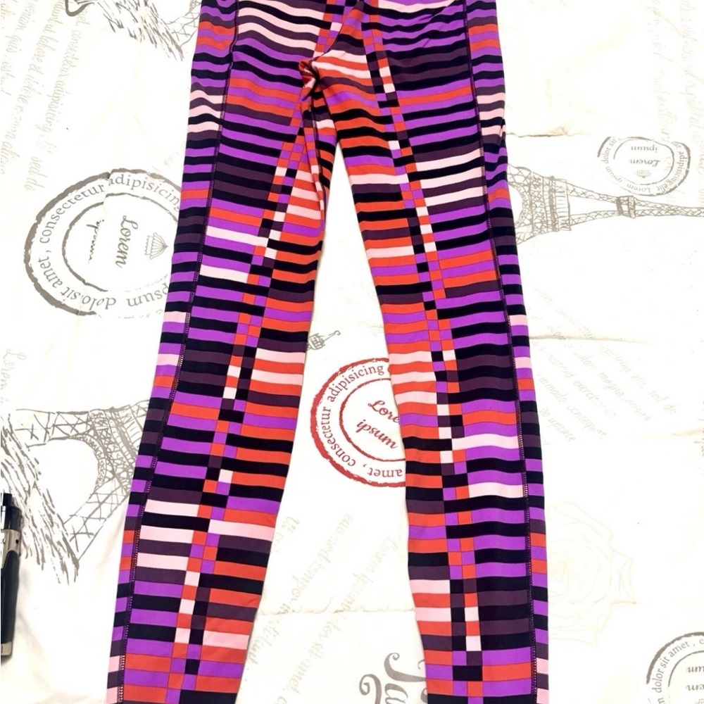 Nike Purple and Pink Geometric Leggings